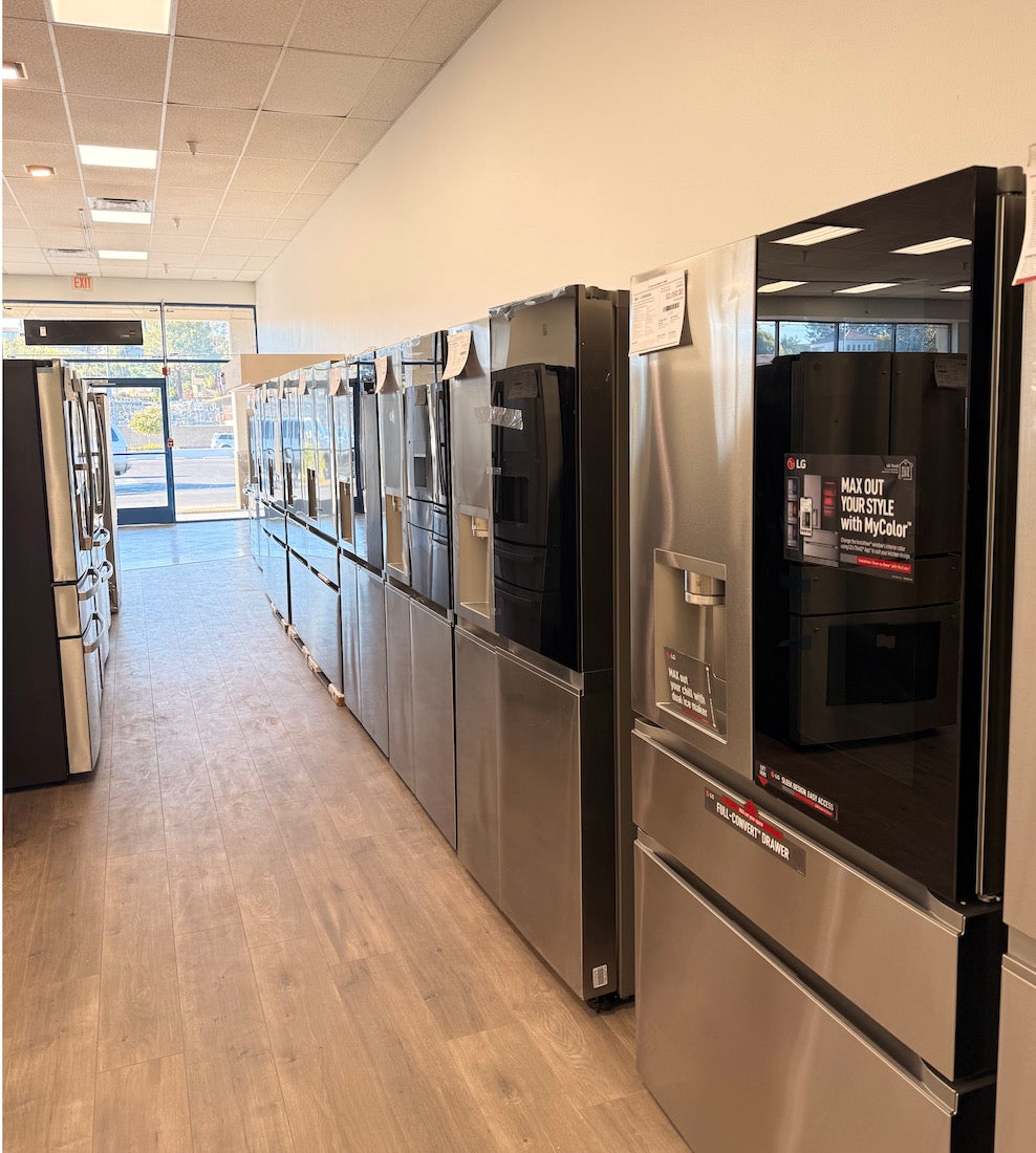 Row of refrigerators in showroom at Appliances 4 Less Santa Clarita